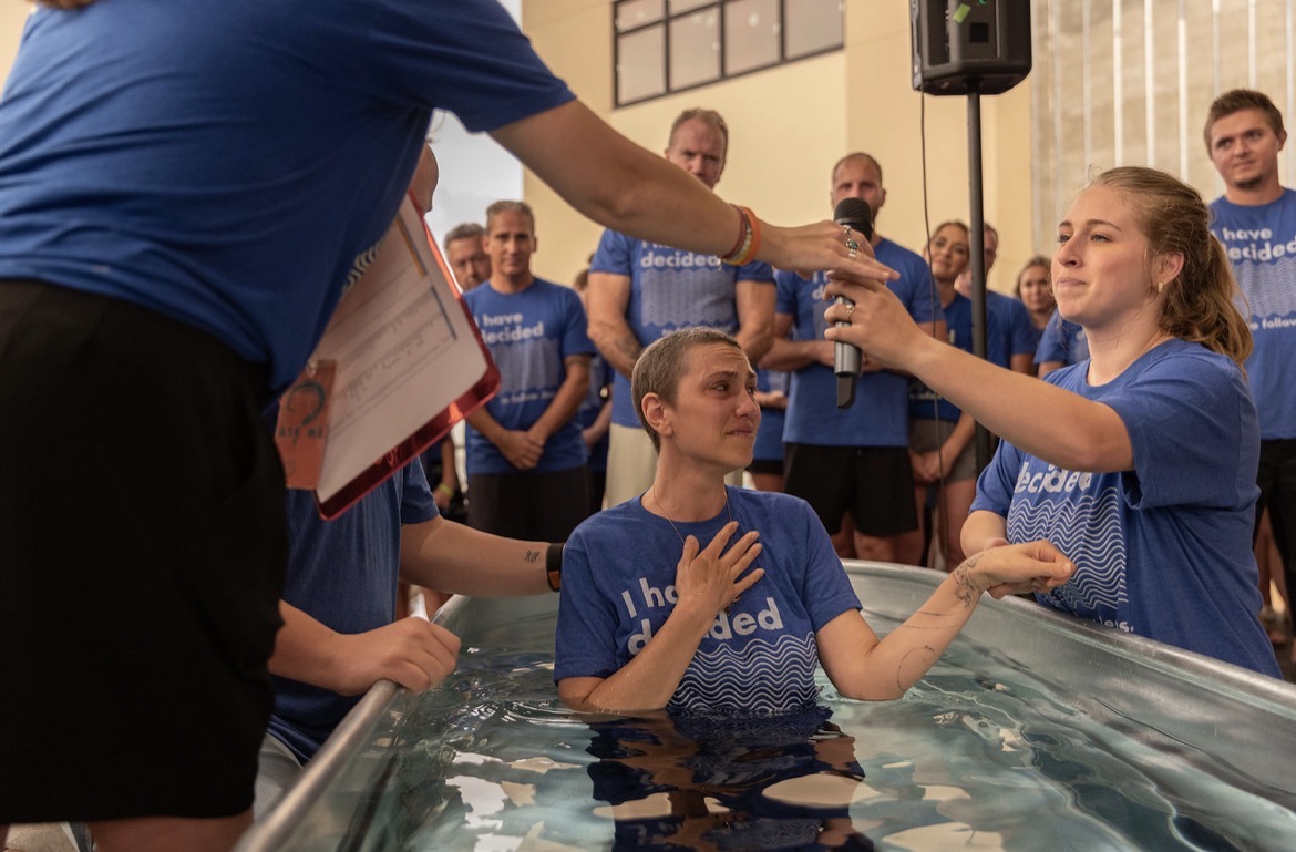 Being prayed for before my baptism, surrounded by my church